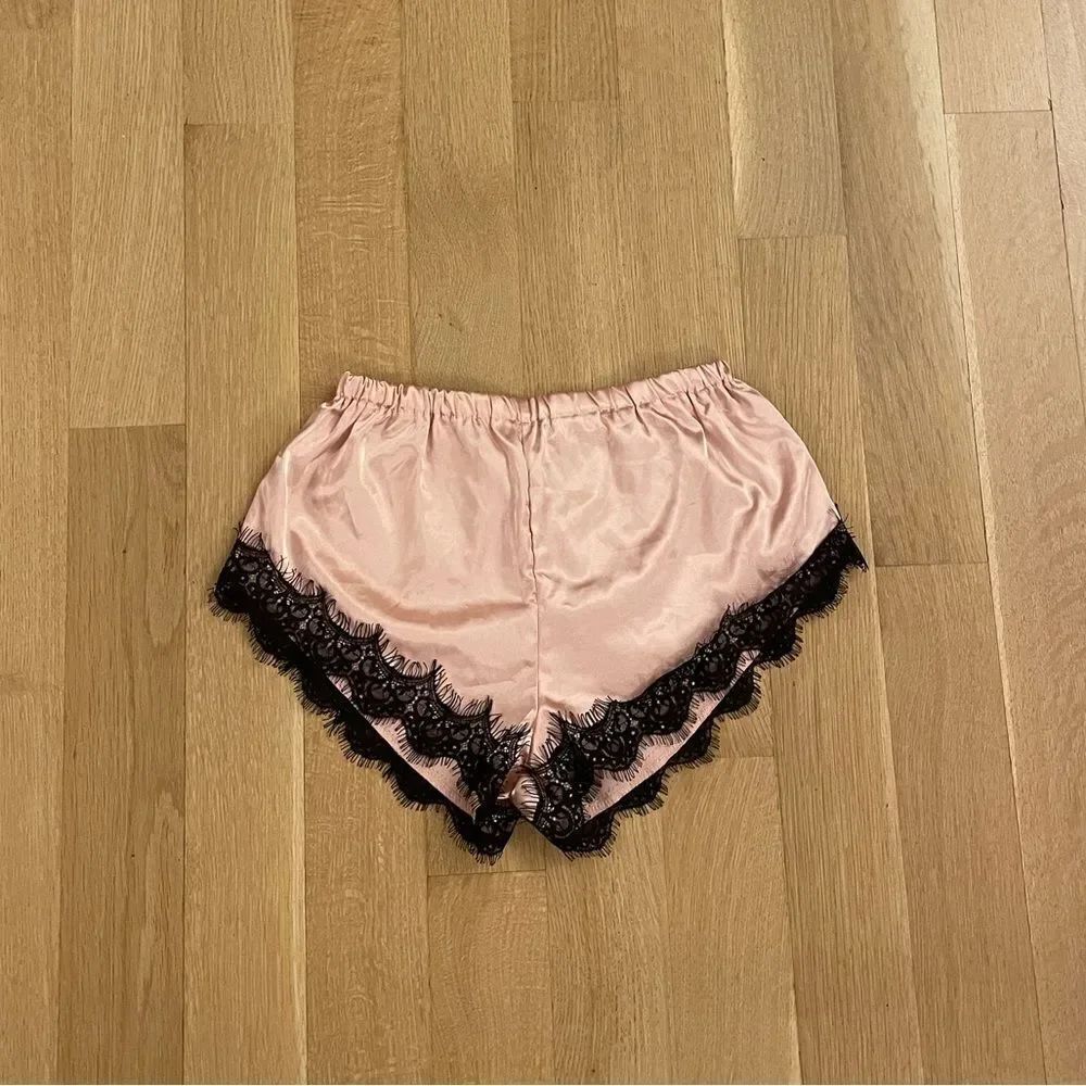 Silky pink pajama shorts with black lace from Shein
